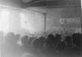 Jock Haston speaking at a mass rally in the Salle des Horticulteurs in Paris, March 1946